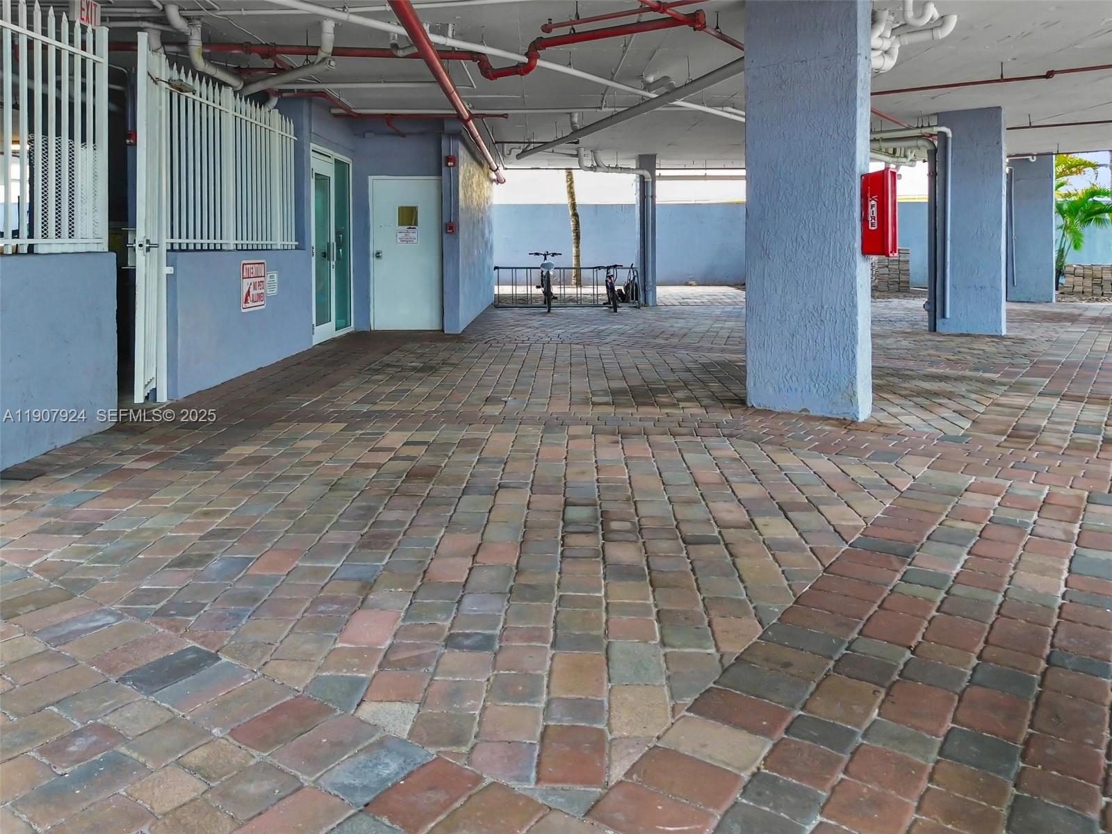 2475 Northwest 16th St Road, Unit 616 Miami, FL 33125 - Photo 31 of 32 a view of a porch