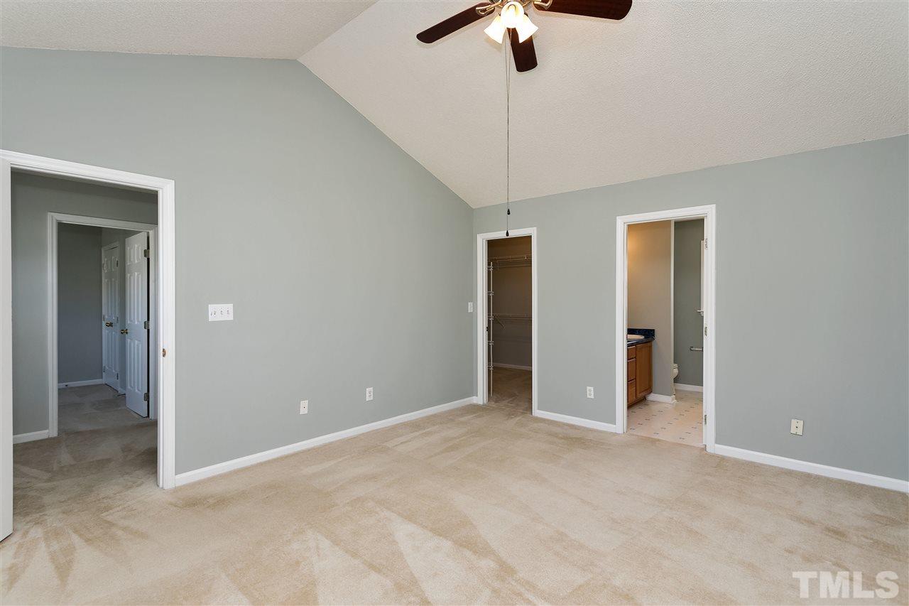 2112 Haig Point Way Raleigh, NC 27604 - Photo 12 of 15 The spacious master bedroom, with great closet space and vaulted ceiling, is the ideal retreat at the end of a long day