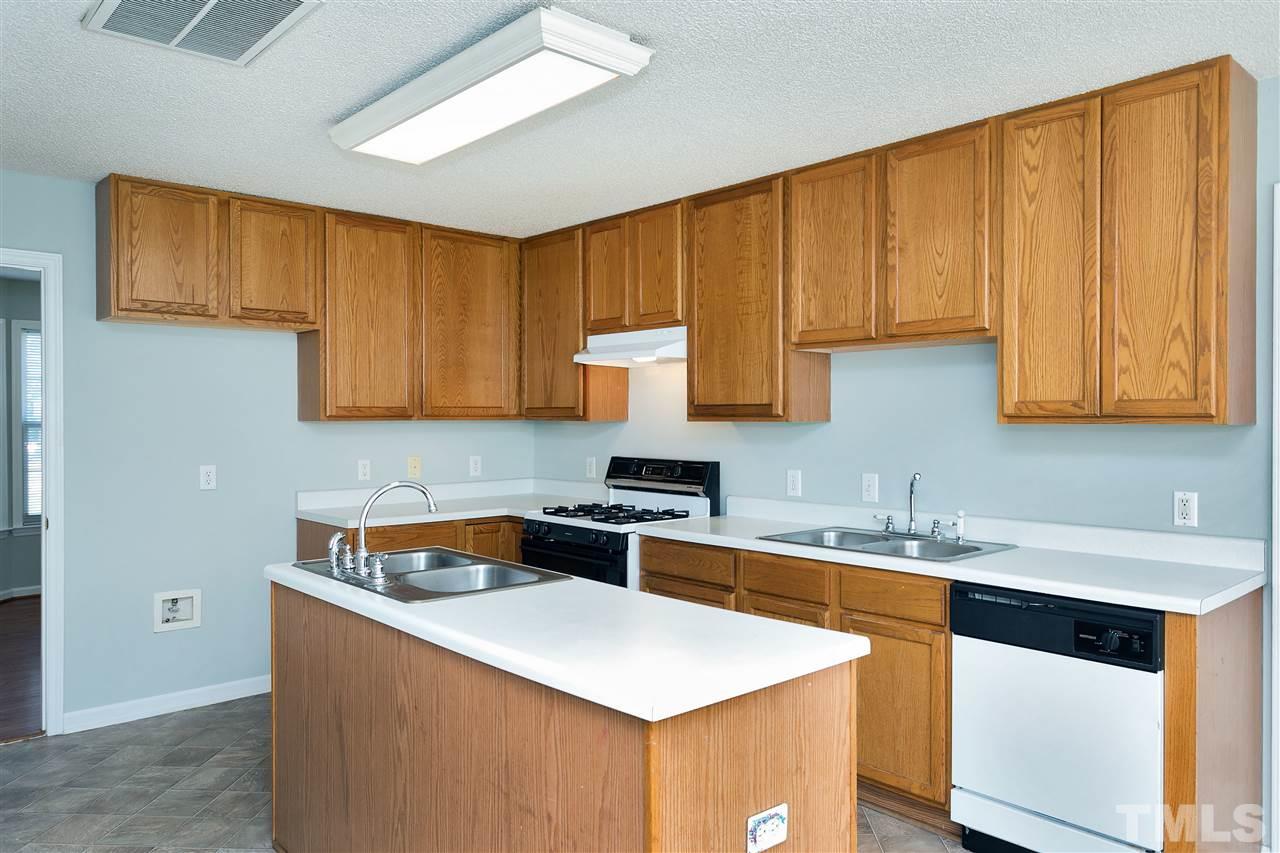 2112 Haig Point Way Raleigh, NC 27604 - Photo 8 of 15 The kitchen is the perfect place to practice your culinary skills. The island provides versatility, and great work space