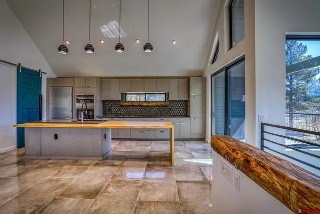 a view of room with wooden floor