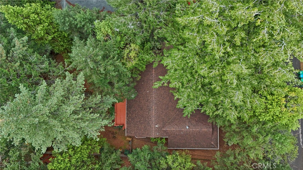 14405 Clarion Way Magalia, CA 95954 - Photo 23 of 25 an aerial view of a house with outdoor space and trees all around