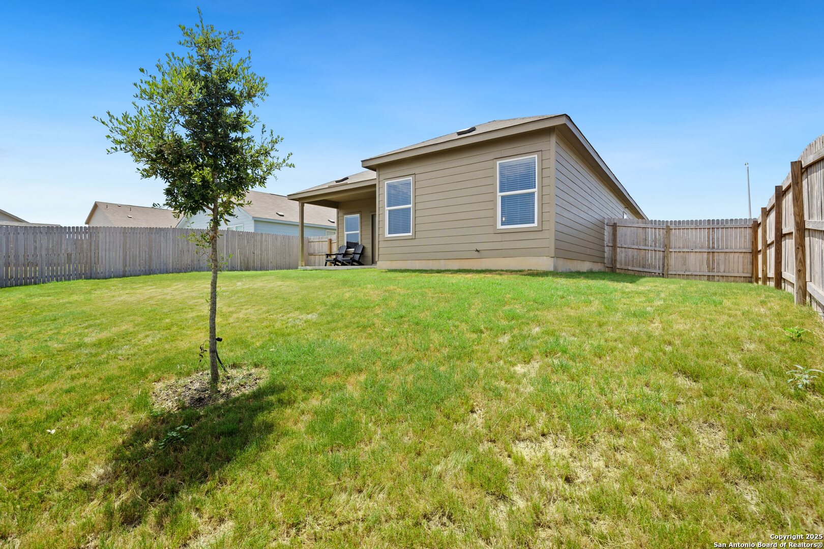 808 Riviera Court Seguin, TX 78155 - Photo 18 of 22 a house with a yard