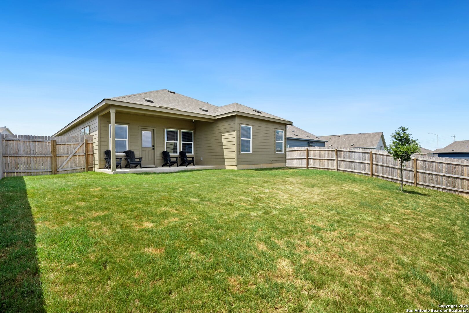 808 Riviera Court Seguin, TX 78155 - Photo 20 of 22 a front view of a house with a yard