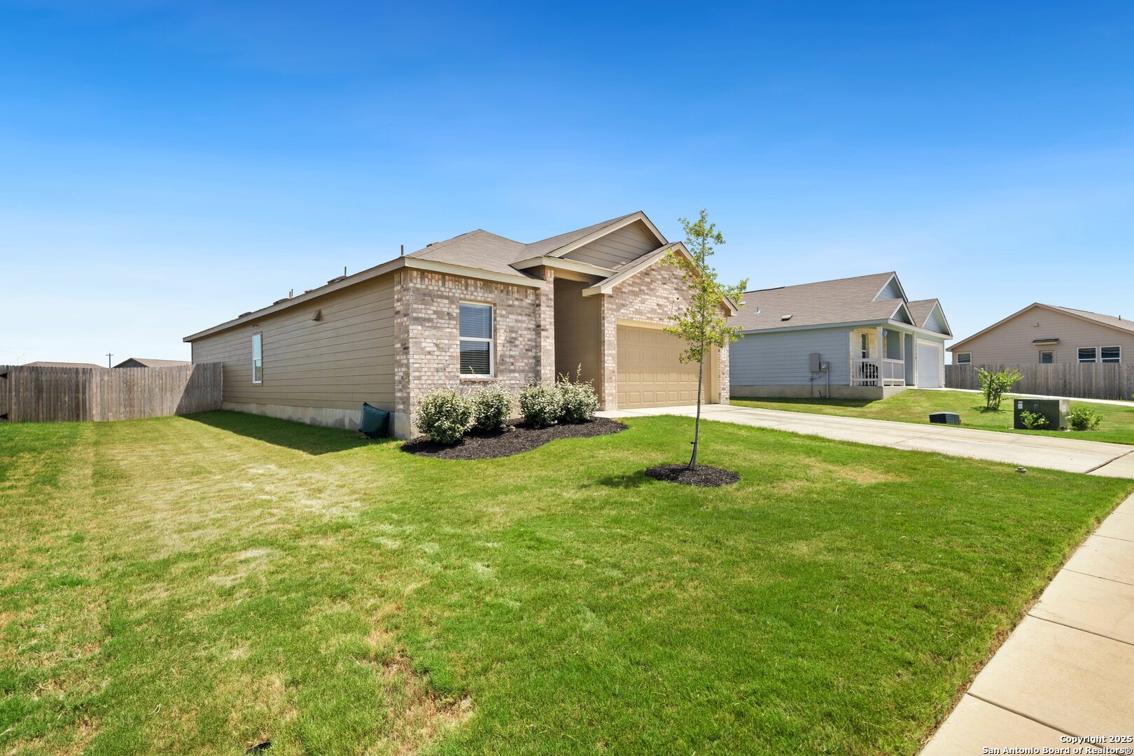 808 Riviera Court Seguin, TX 78155 - Photo 2 of 22 a house view with a garden space