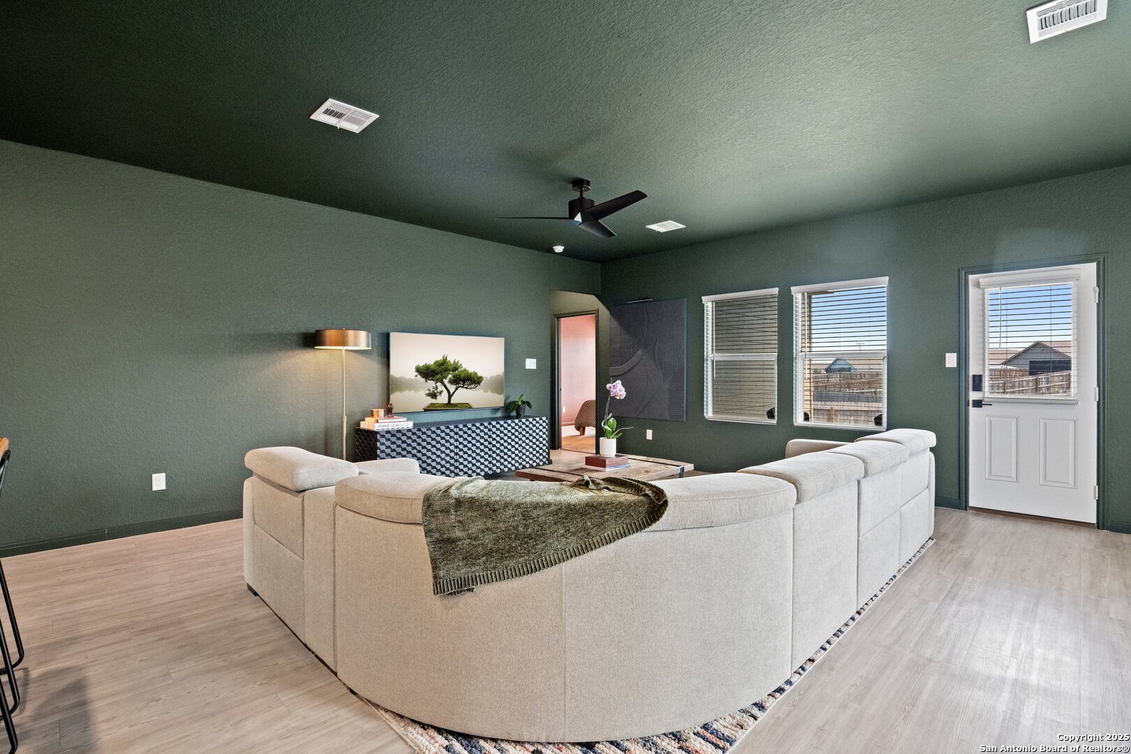 808 Riviera Court Seguin, TX 78155 - Photo 4 of 22 a living room with furniture and a wooden floor