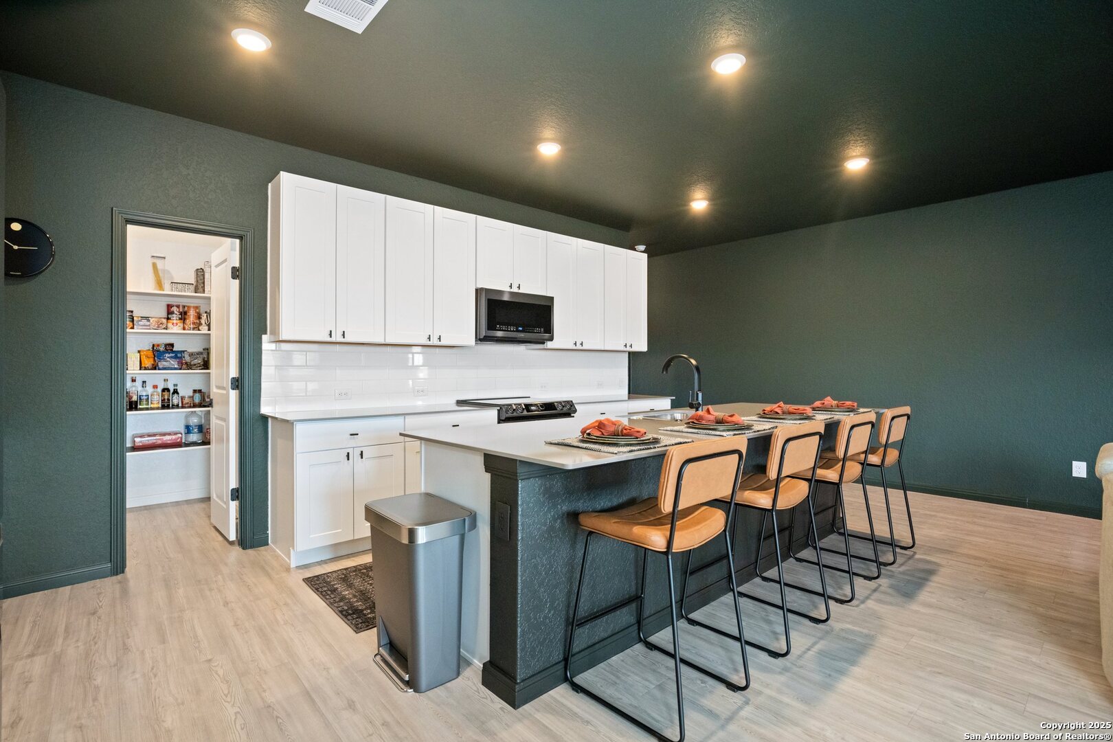 808 Riviera Court Seguin, TX 78155 - Photo 7 of 22 a kitchen that has a table and chairs in it