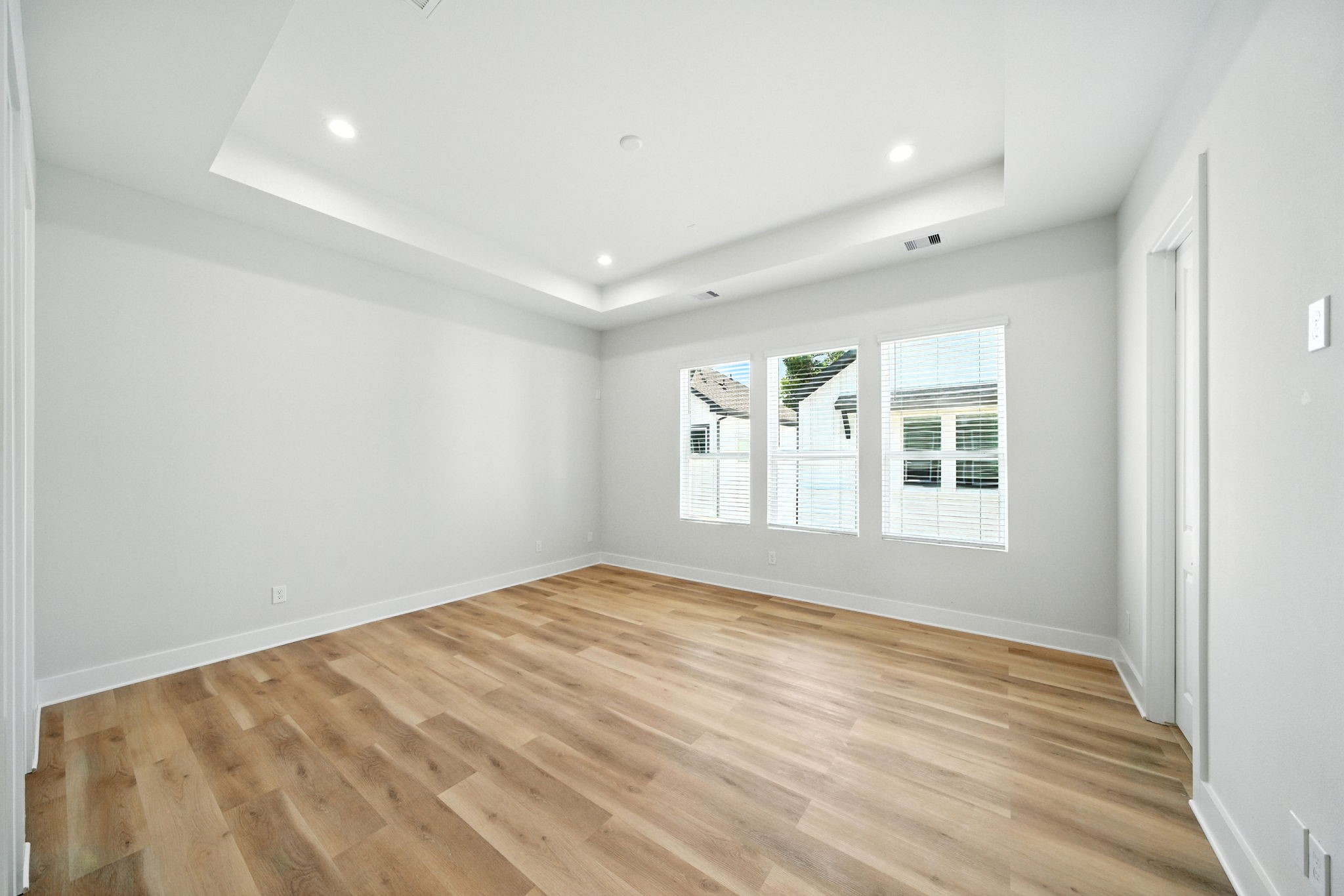 1985 Bauer Drive Houston, TX 77080 - Photo 26 of 35 a view of empty room with wooden floor and fan