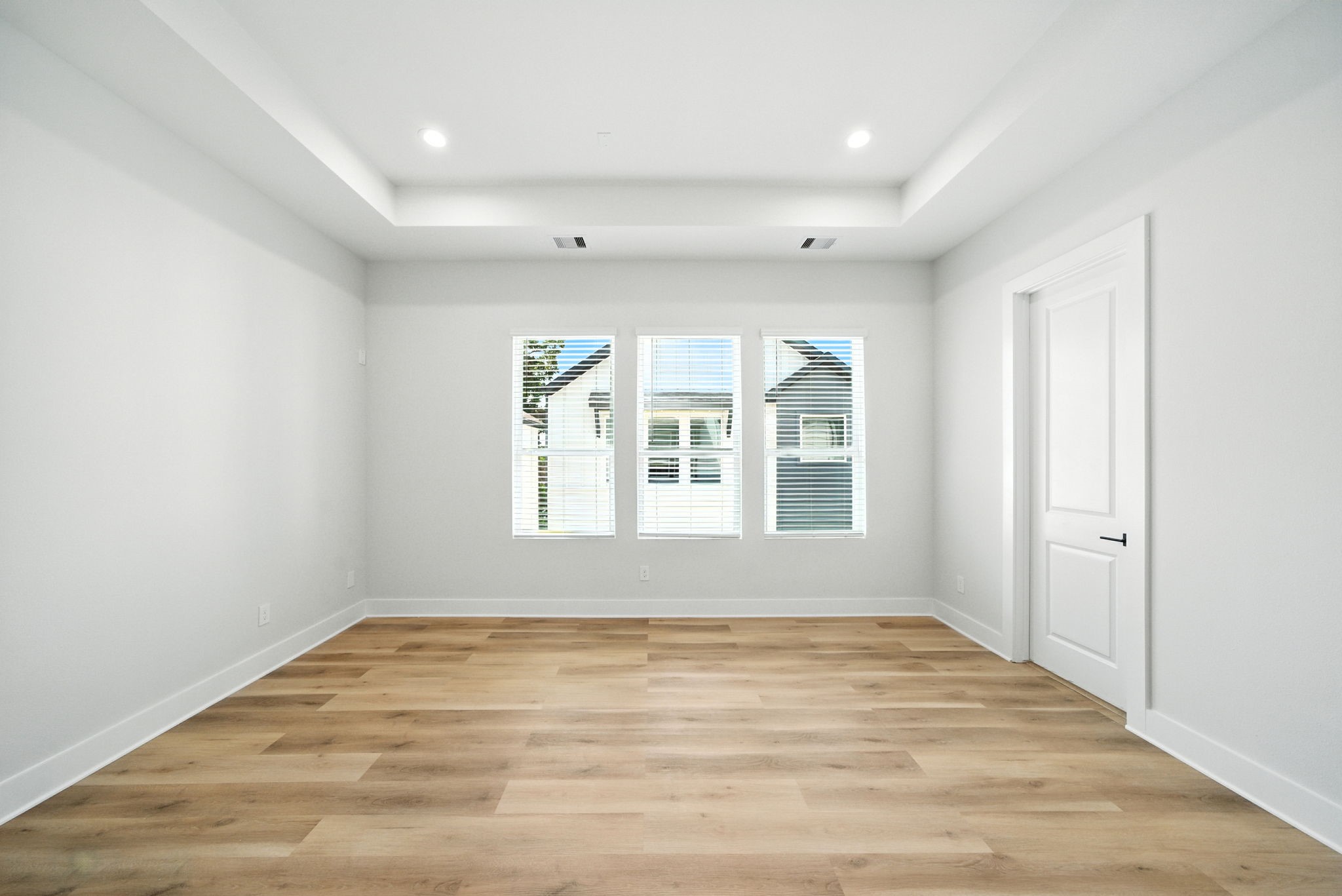 1985 Bauer Drive Houston, TX 77080 - Photo 29 of 35 a view of empty room with wooden floor and fan