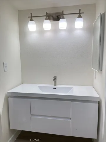 a bathroom with a shower and toilet