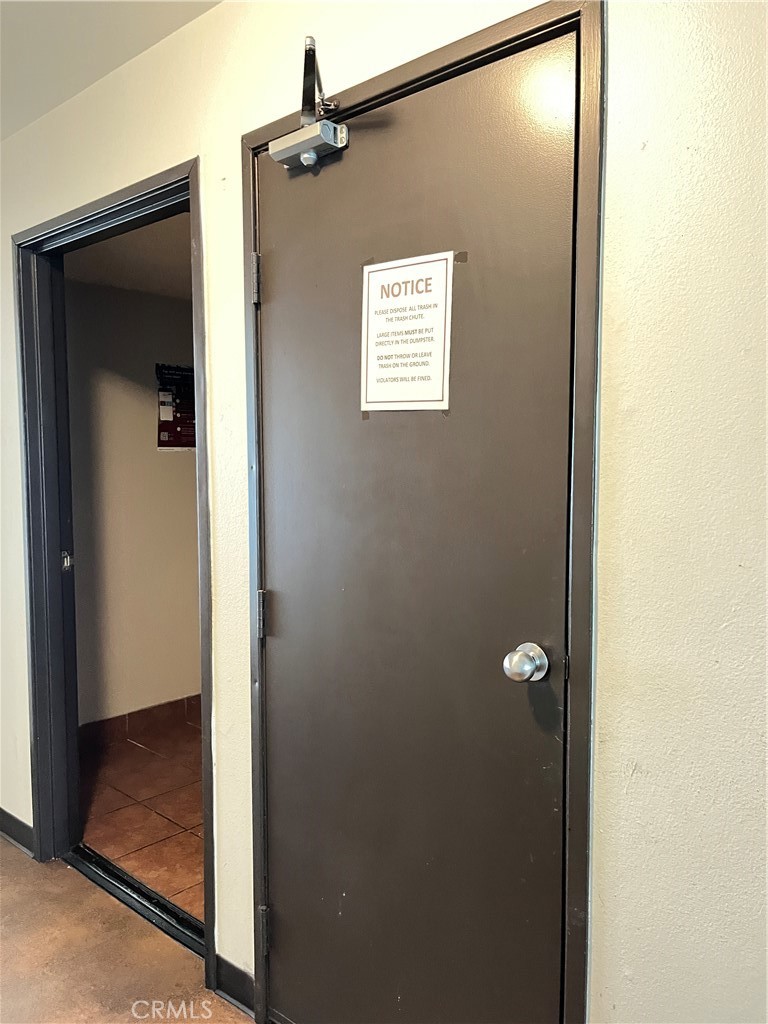 435 South Virgil Avenue, Unit 209 Los Angeles, CA 90020 - Photo 28 of 31 a view of a hallway with a door