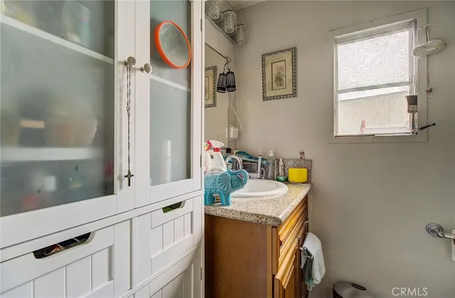 a utility room with faucet washer and dryer