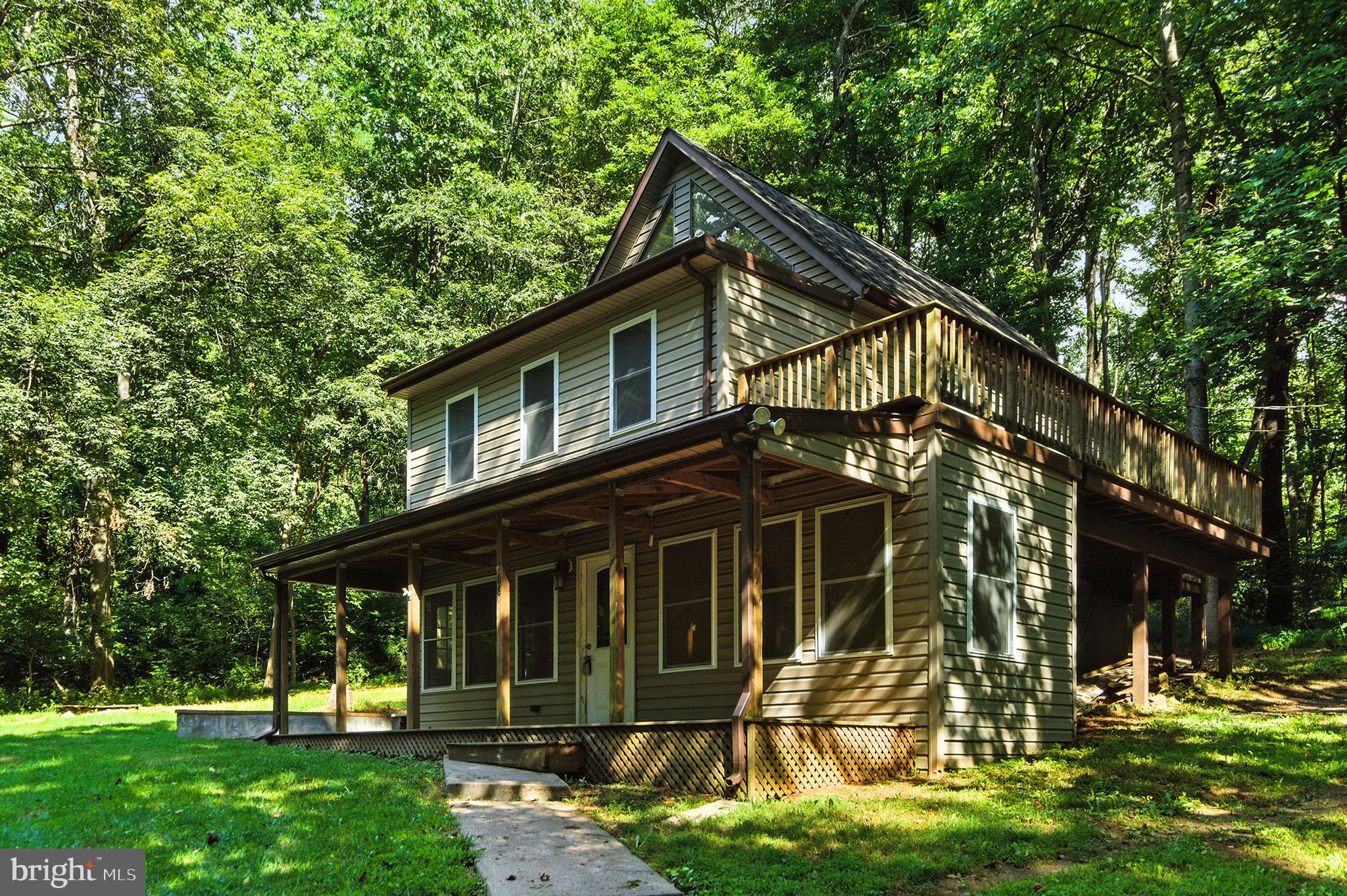 106 Inca Road Linden, VA 22642 - Photo 12 of 17 a view of a house with a yard