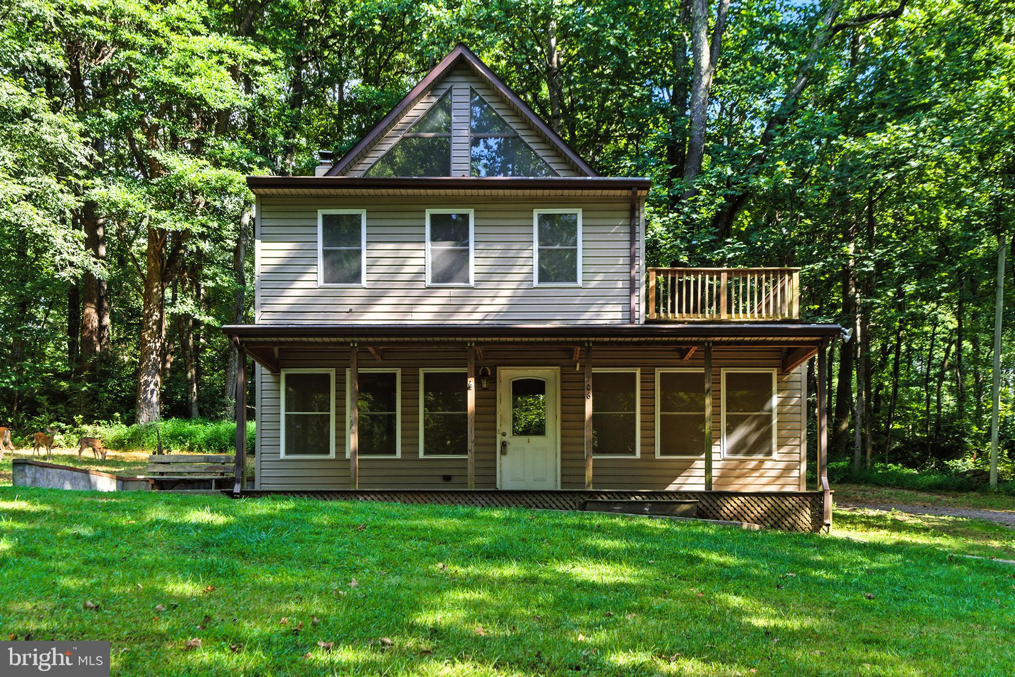 106 Inca Road Linden, VA 22642 - Photo 17 of 17 a front view of a house with a yard