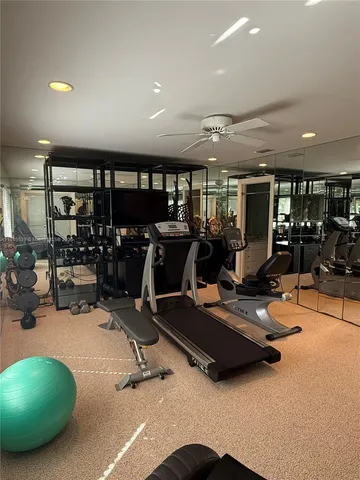a room with lots of gym equipment