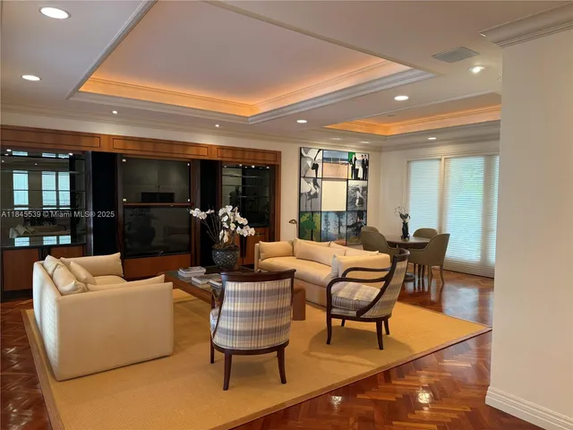 a living room with furniture and window