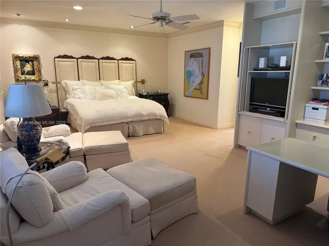 a bathroom with a granite countertop sink and a bathtub