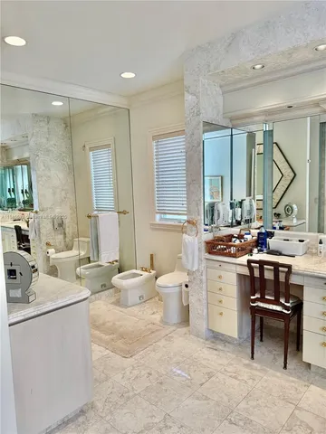 a bathroom with a shower and a sink