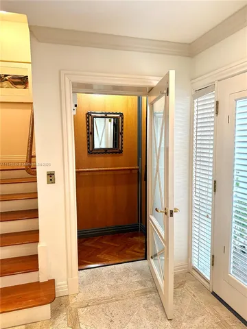 a bedroom with bed and window