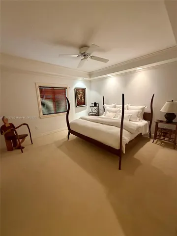 a large bathroom with a double vanity sink a mirror and a shower