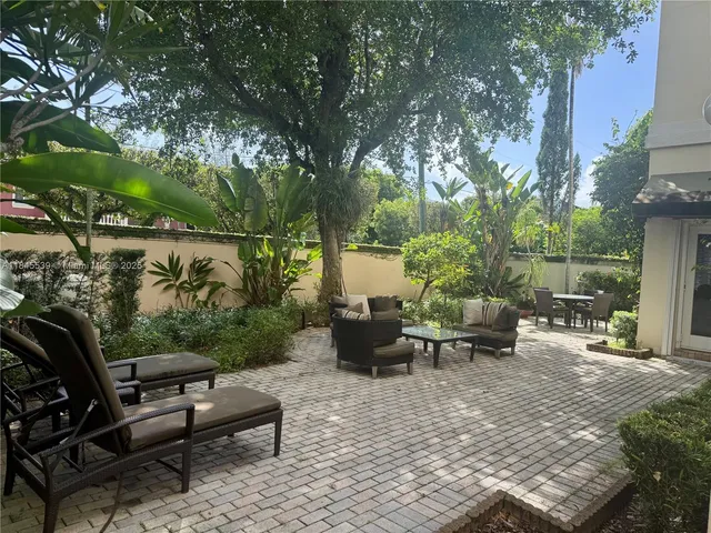 a room with gym equipment and a large window