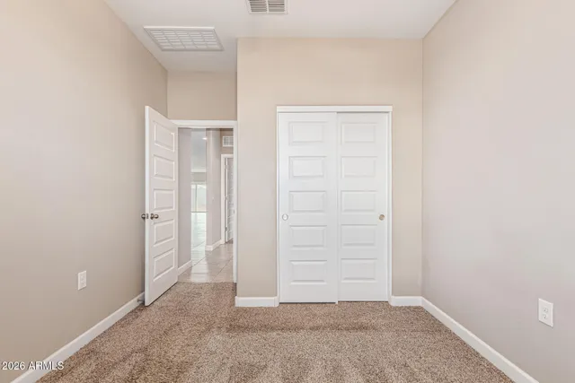 an empty room with closet