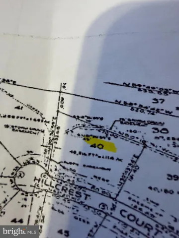 a view of a swimming pool and an outdoor seating