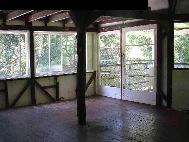497 Kawelo Road Haiku, HI 96708 - Photo 10 of 18 a view of empty room with wooden floor and fan
