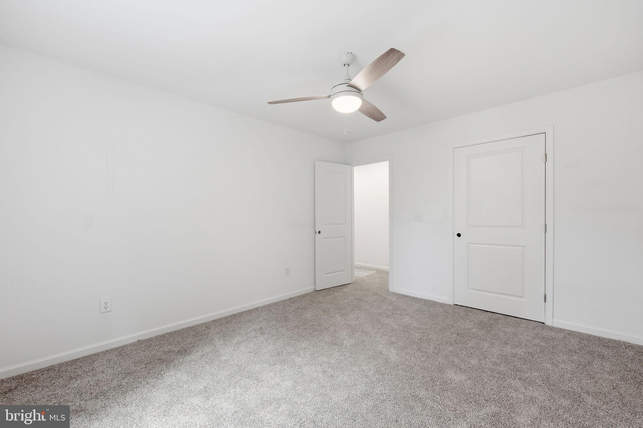 10339 Back Creek Valley Road Hedgesville, WV 25427 - Photo 35 of 48 wooden floor in an empty room