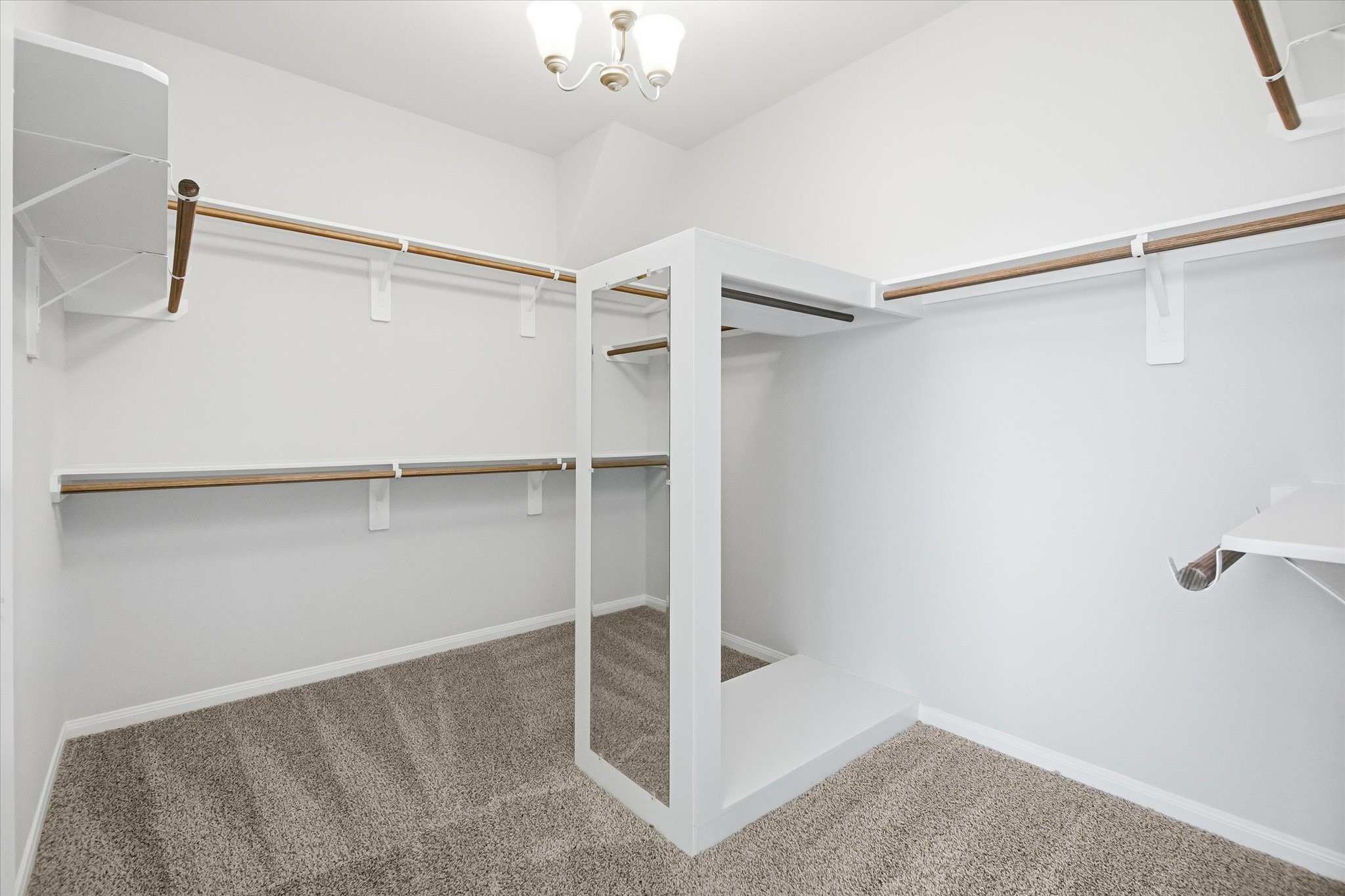 16738 Rockwall Street Conroe, TX 77303 - Photo 20 of 42 The extended walk-in closet delivers impressive storage and is designed to keep everything organized and easily accessible.