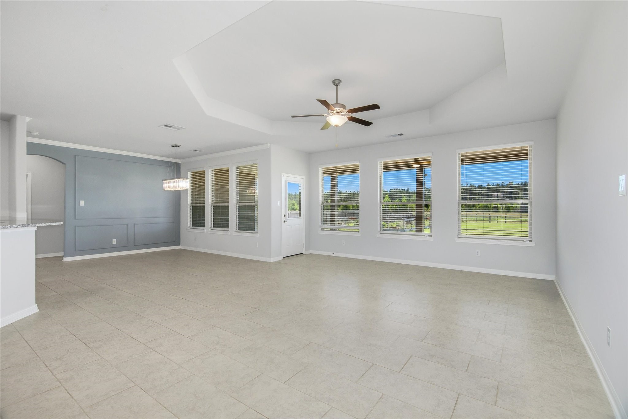 16738 Rockwall Street Conroe, TX 77303 - Photo 6 of 42 This entryway naturally draws you inward, setting the stage for the home’s warm and open living spaces.