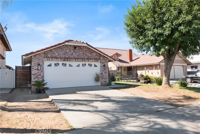 a front view of a building with garden