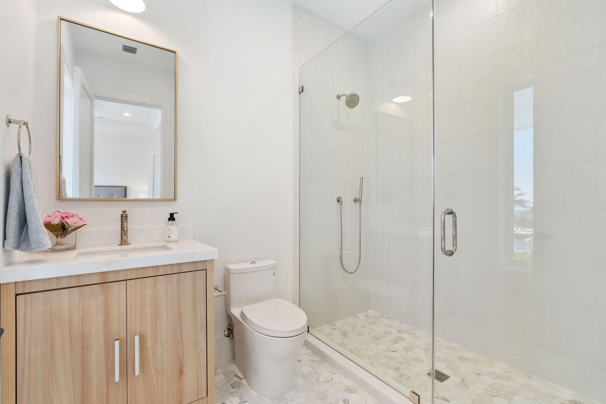 1002 Snapper Lane Key Largo, FL 33037 - Photo 35 of 106 a bathroom with a sink a toilet and shower