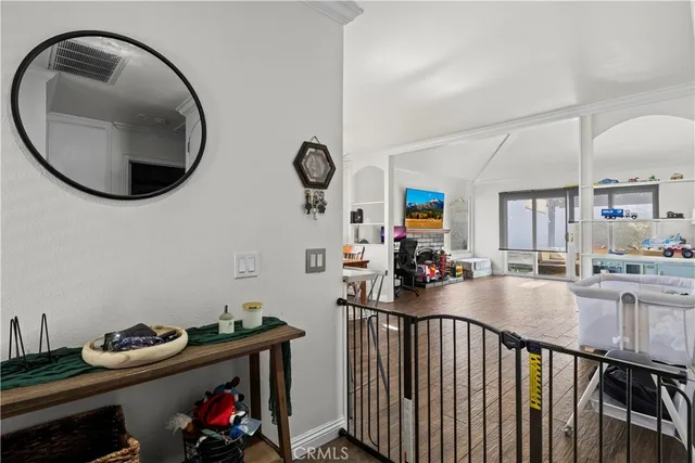 a view of a livingroom with furniture and toys