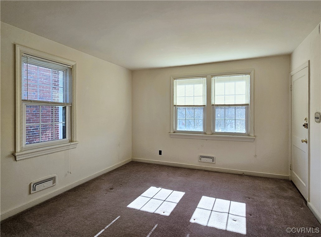 3410 Stuart Avenue Richmond, VA 23221 - Photo 21 of 43 an empty room with windows
