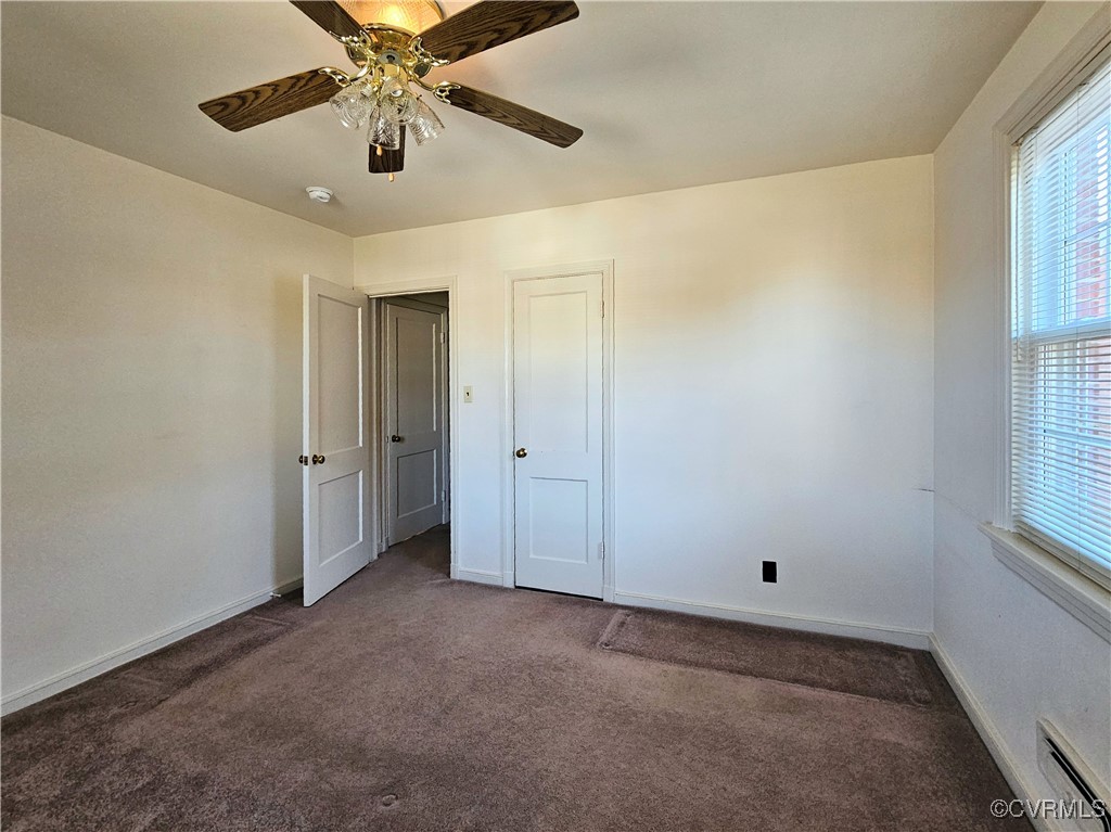 3410 Stuart Avenue Richmond, VA 23221 - Photo 37 of 43 a view of an empty room and window chandelier fan