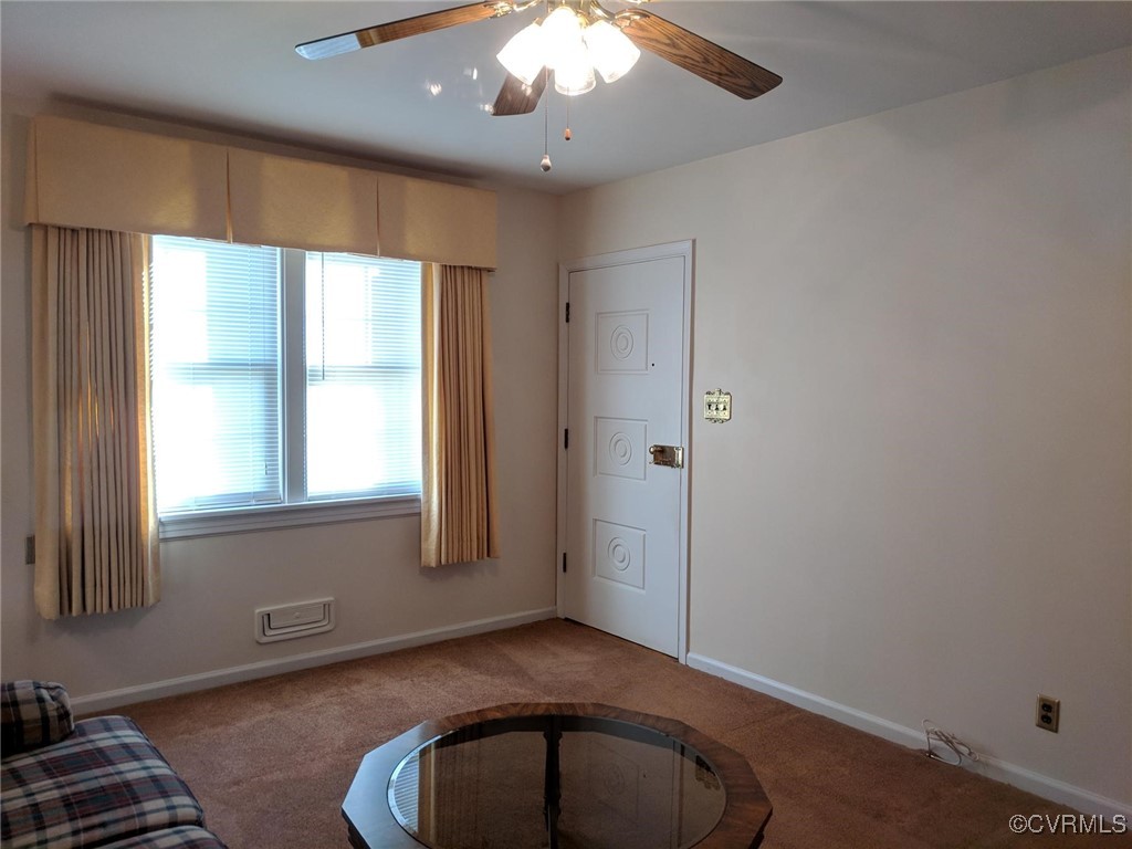 3410 Stuart Avenue Richmond, VA 23221 - Photo 4 of 43 an empty room with windows