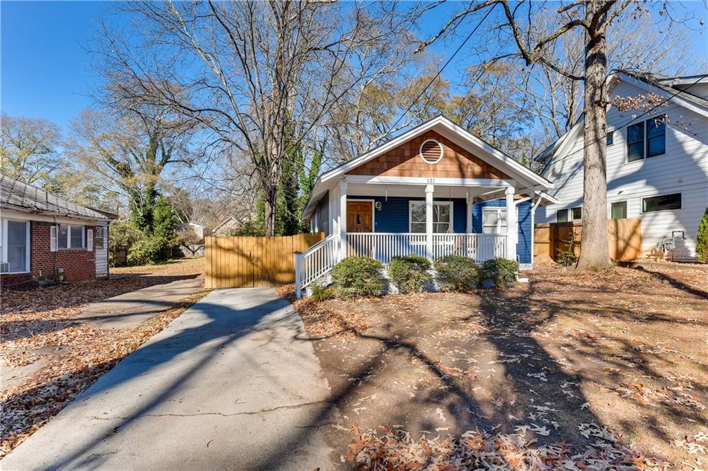 131 Maxwell Street Decatur, GA 30030 - Photo 1 of 1 a front view of a house with a yard