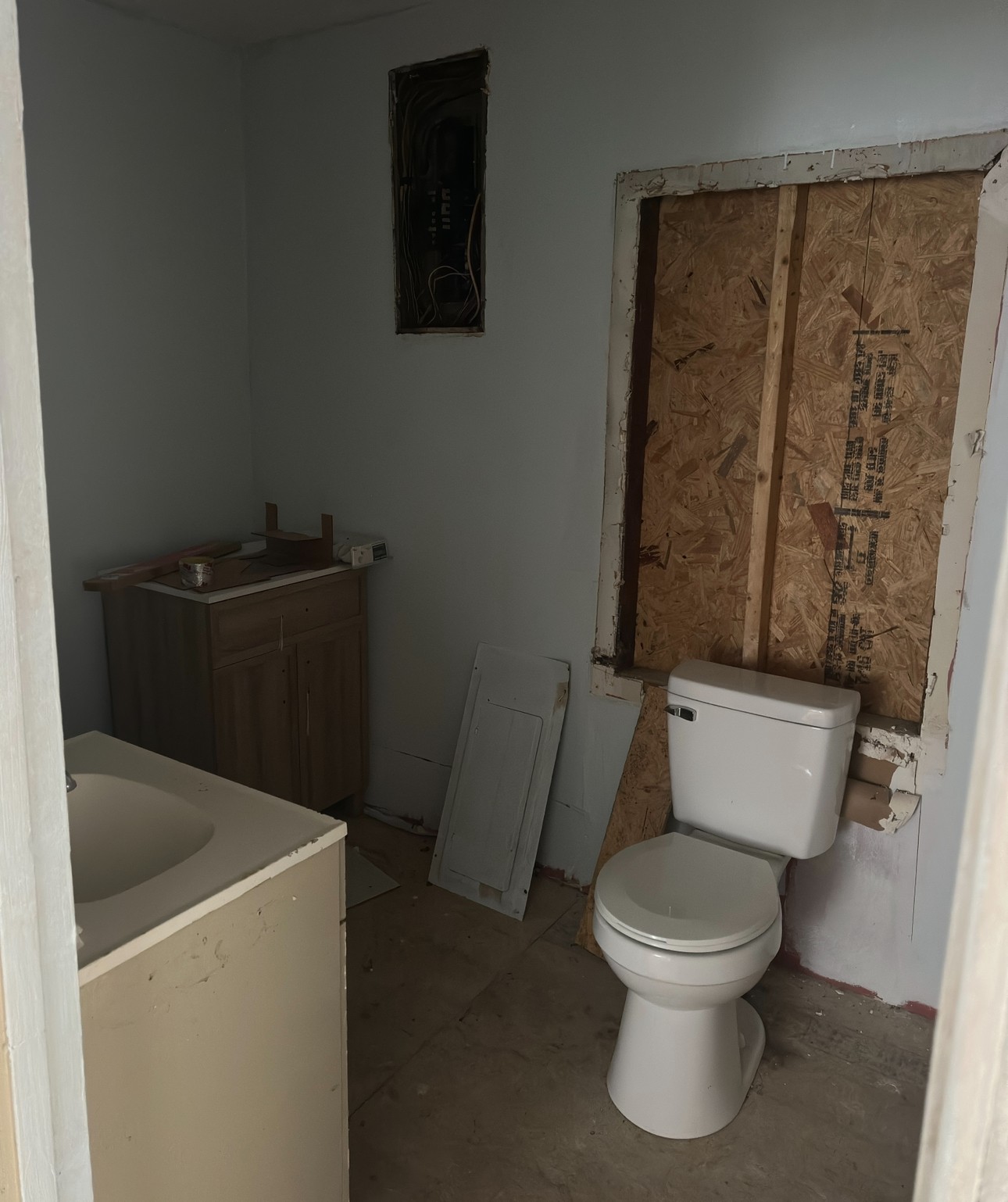 2125 Butler Road Hopkinsville, KY 42240 - Photo 7 of 10 a white toilet sitting next to a bathroom sink