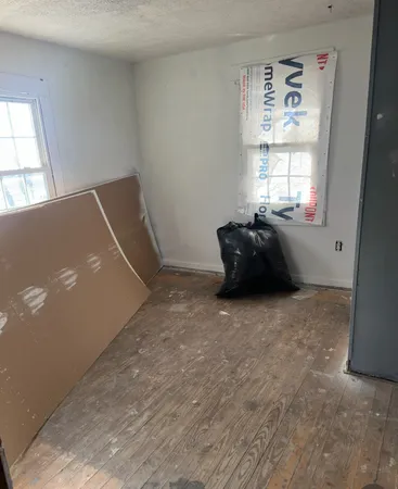 a room with window and couch