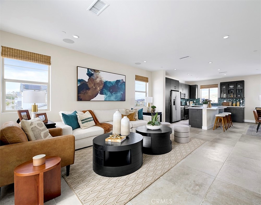 2600 Sprout Lane Corona, CA 92883 - Photo 7 of 30 a living room with furniture and view of kitchen