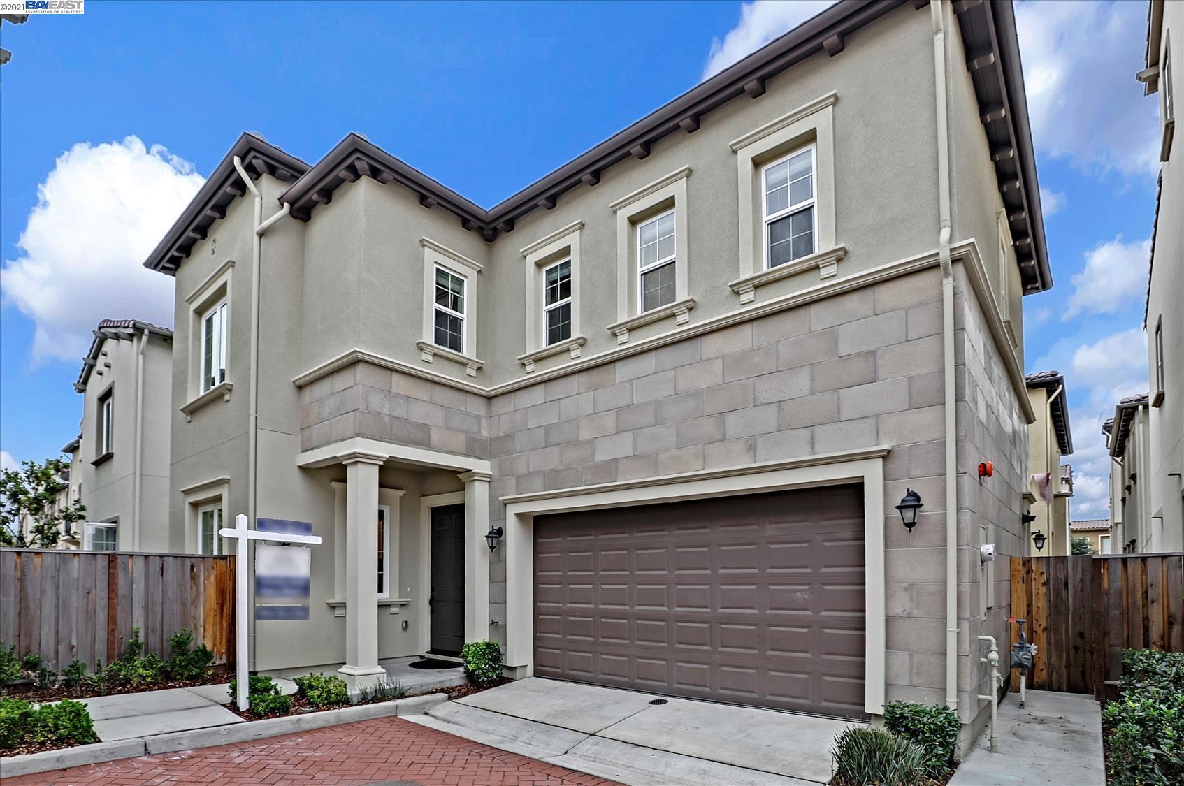 a view of a white building among the street