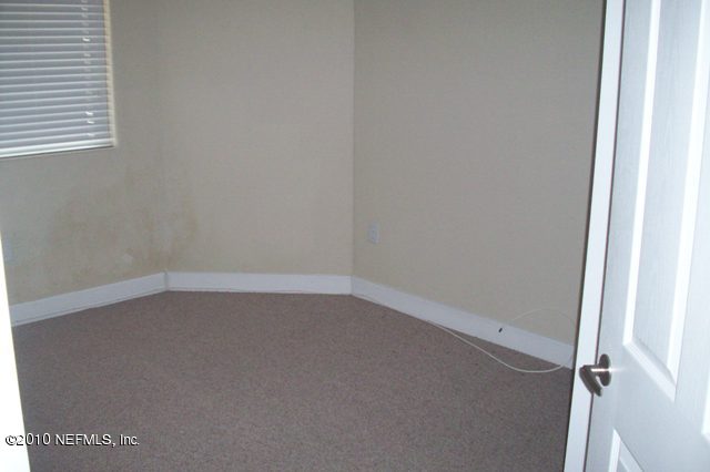 9745 Touchton Road, Unit 1701 Jacksonville, FL 32246 - Photo 11 of 12 a room that has a window in it