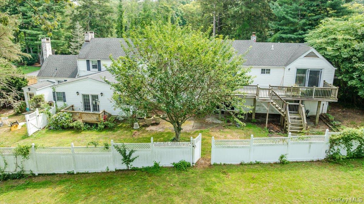 221 Huntington Bay Road Huntington, NY 11743 - Photo 13 of 23 an aerial view of a house with swimming pool garden and patio