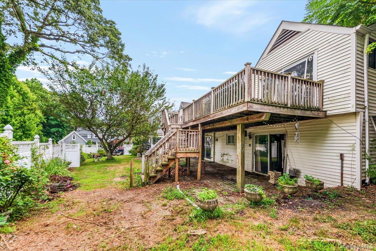 221 Huntington Bay Road Huntington, NY 11743 - Photo 17 of 23 a view of a house with a yard