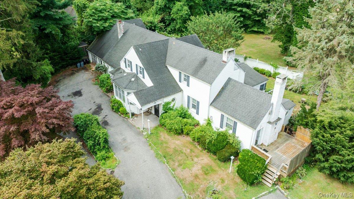 221 Huntington Bay Road Huntington, NY 11743 - Photo 4 of 23 an aerial view of a house