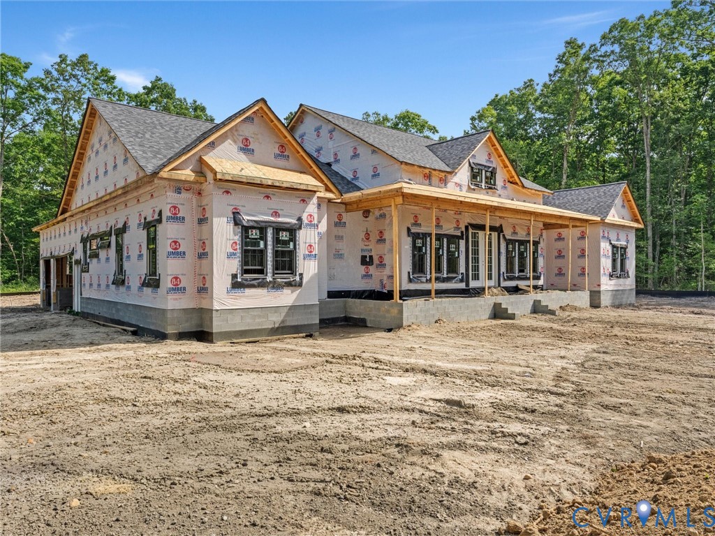 13216 Bradley Bridge Road Chester, VA 23831 - Photo 4 of 12 a front view of a house with a yard