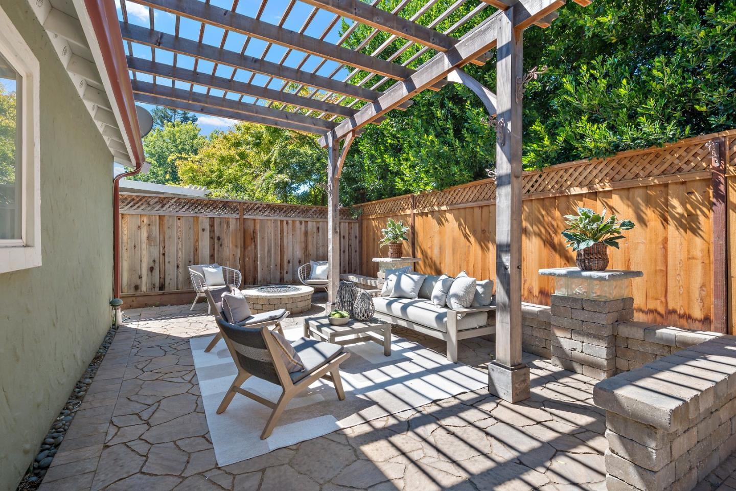 1629 Cherry Avenue San Jose, CA 95125 - Photo 44 of 61 a view of a patio with table and chairs potted plants and large tree