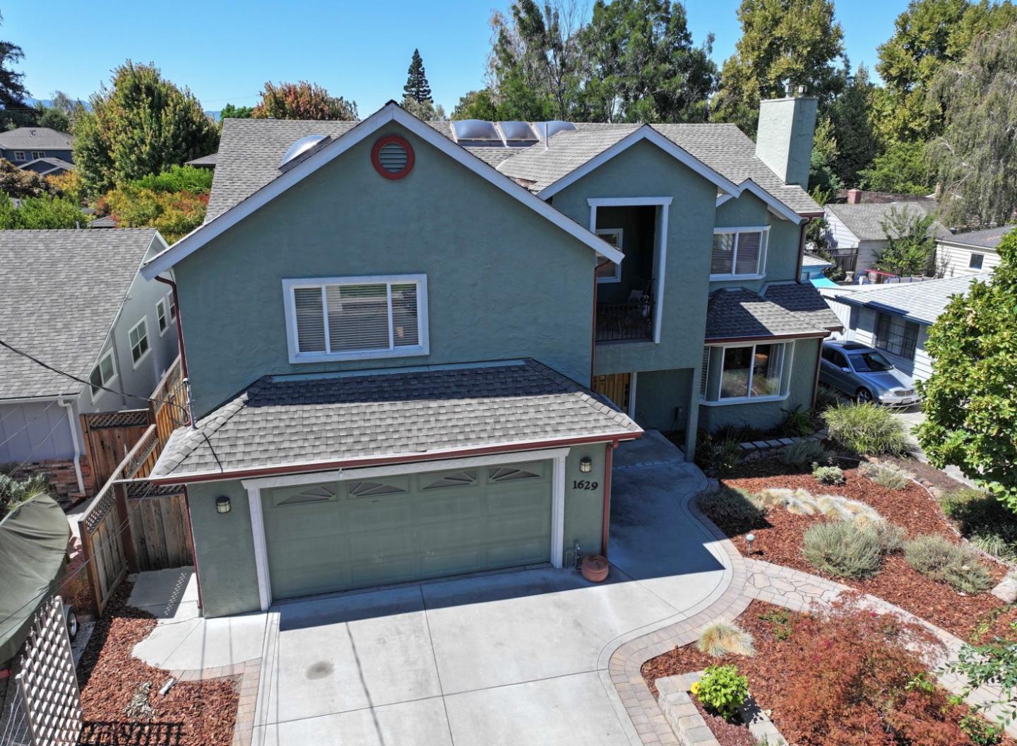 1629 Cherry Avenue San Jose, CA 95125 - Photo 50 of 61 a front view of a house with a garage