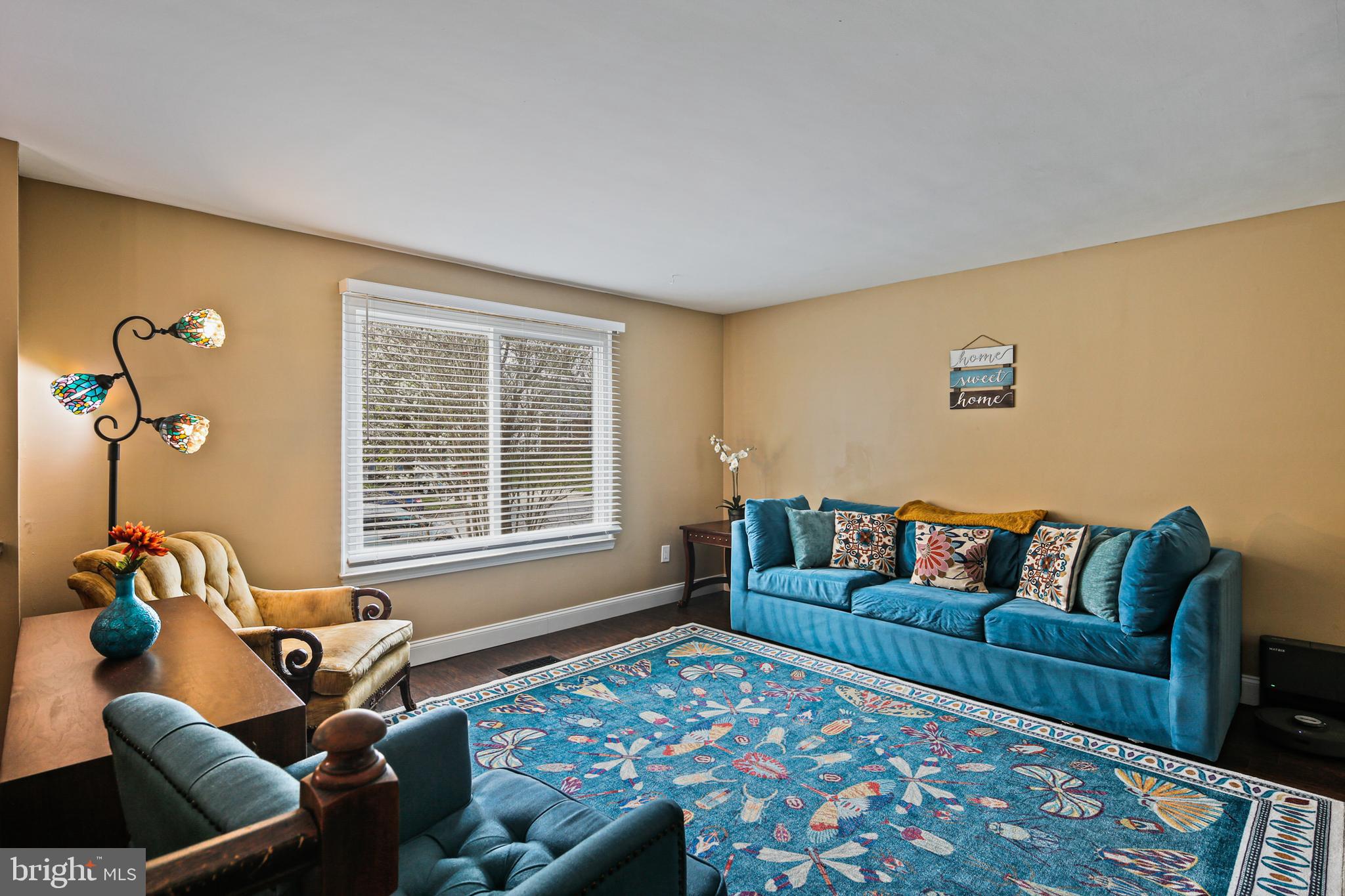 9348 Northgate Road Laurel, MD 20723 - Photo 11 of 42 a living room with furniture and a window