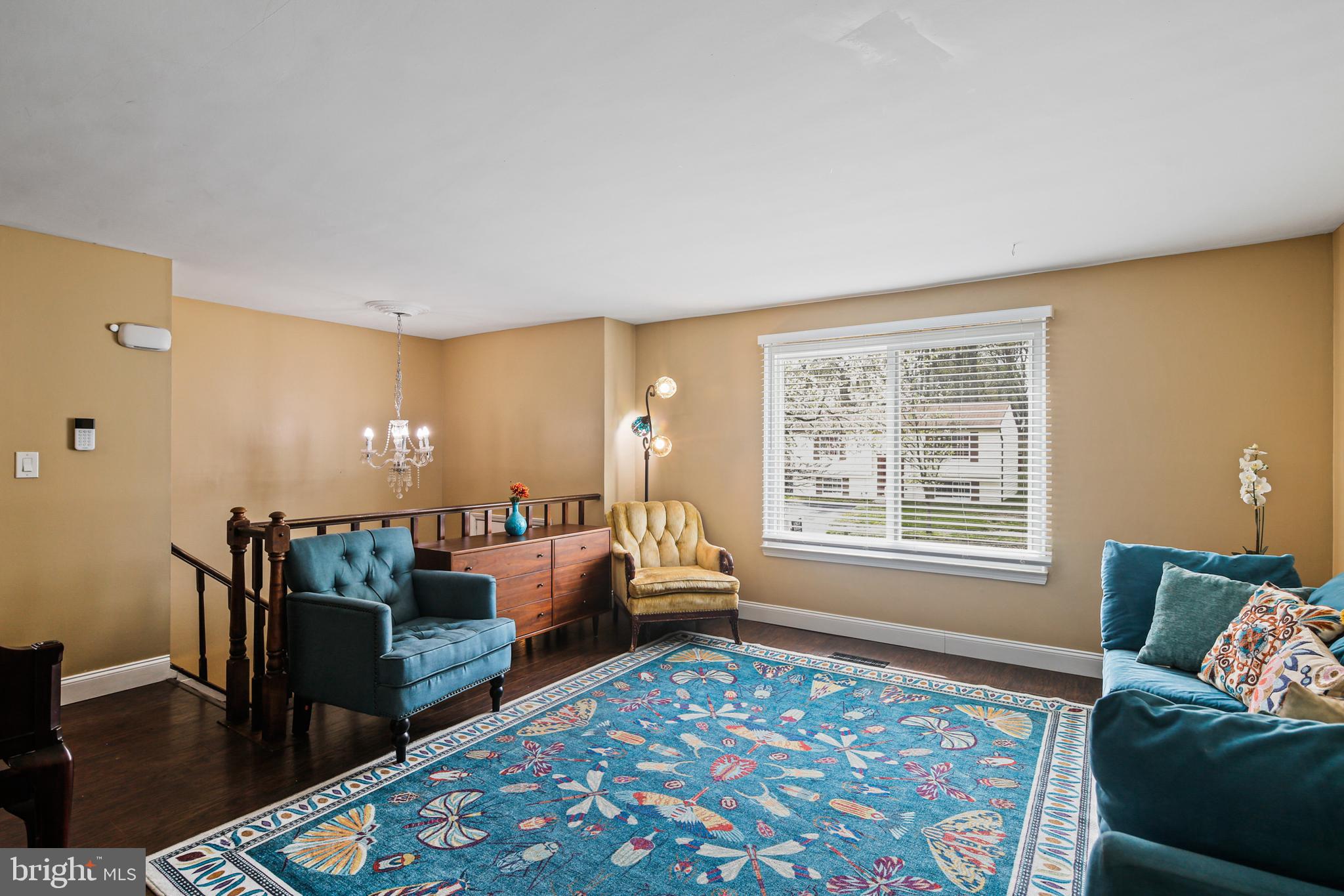 9348 Northgate Road Laurel, MD 20723 - Photo 12 of 42 a living room with furniture and a rug